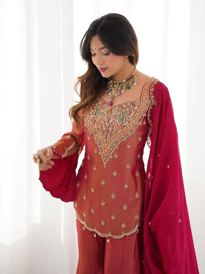 Royal elegance in this beautifully embroidered pink Sharara set.
