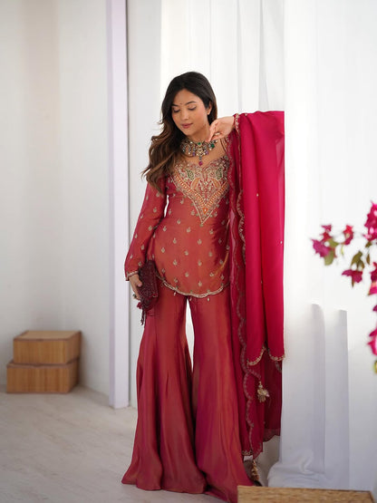 Royal elegance in this beautifully embroidered pink Sharara set.