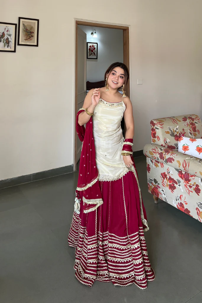 elegant ruby red sharara suit set with ivory embroidered kurti