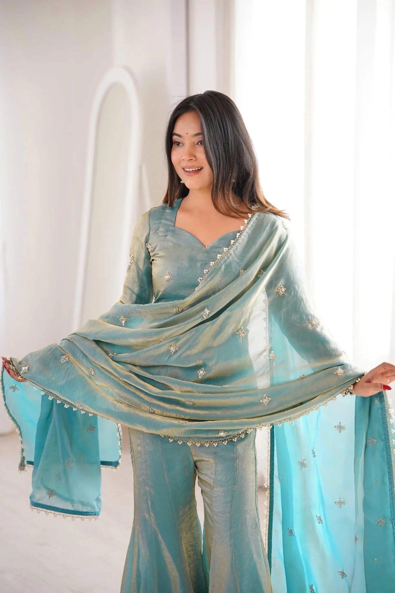elegant sea green sharara suit set with embellished dupatta