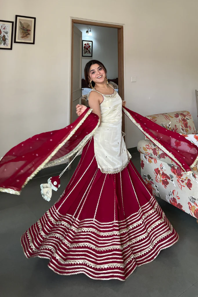 elegant ruby red sharara suit set with ivory embroidered kurti