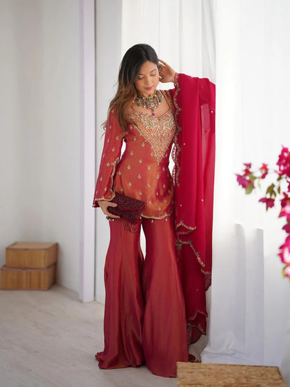 Royal elegance in this beautifully embroidered pink Sharara set.