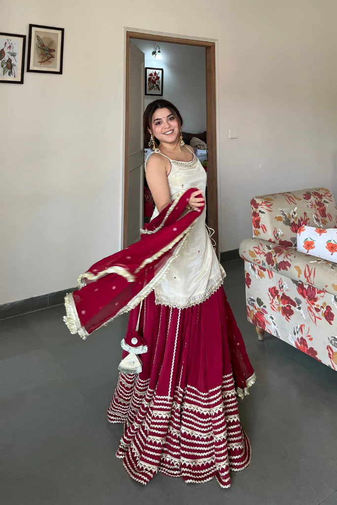 elegant ruby red sharara suit set with ivory embroidered kurti