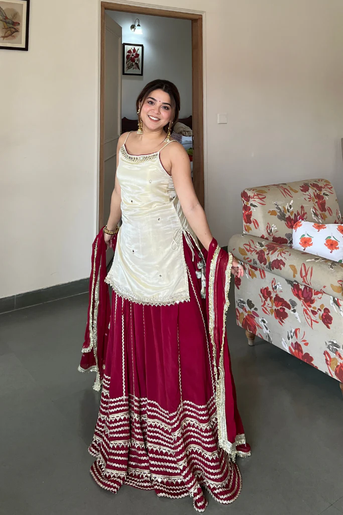 elegant ruby red sharara suit set with ivory embroidered kurti