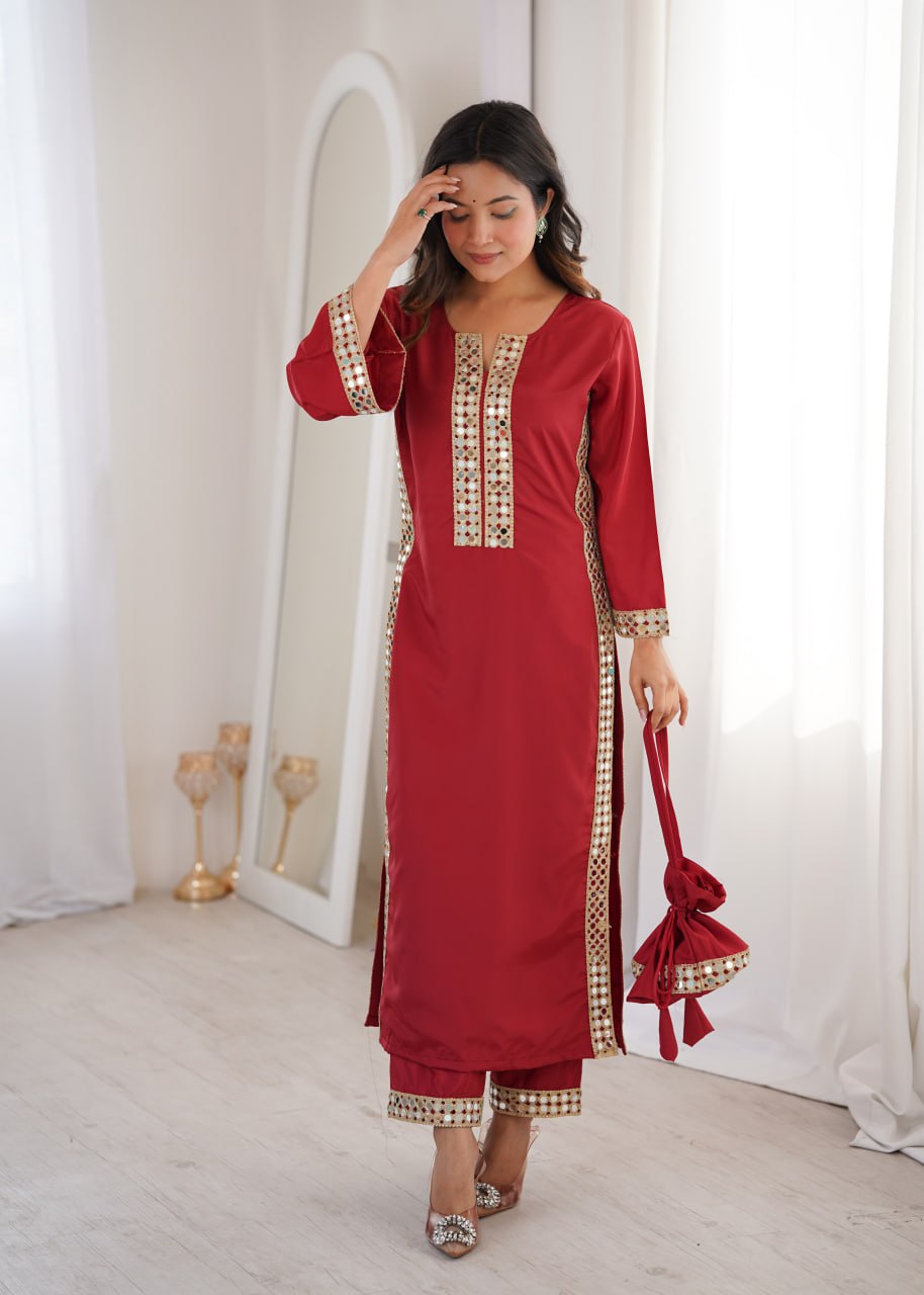 pink mirror work kurta and bottom with potali