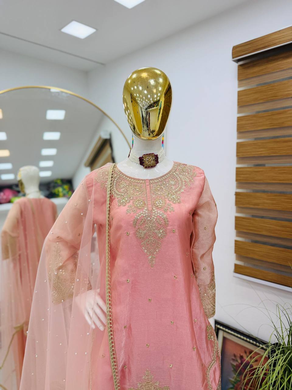 blush pink embroidered palazzo suit with net dupatta
