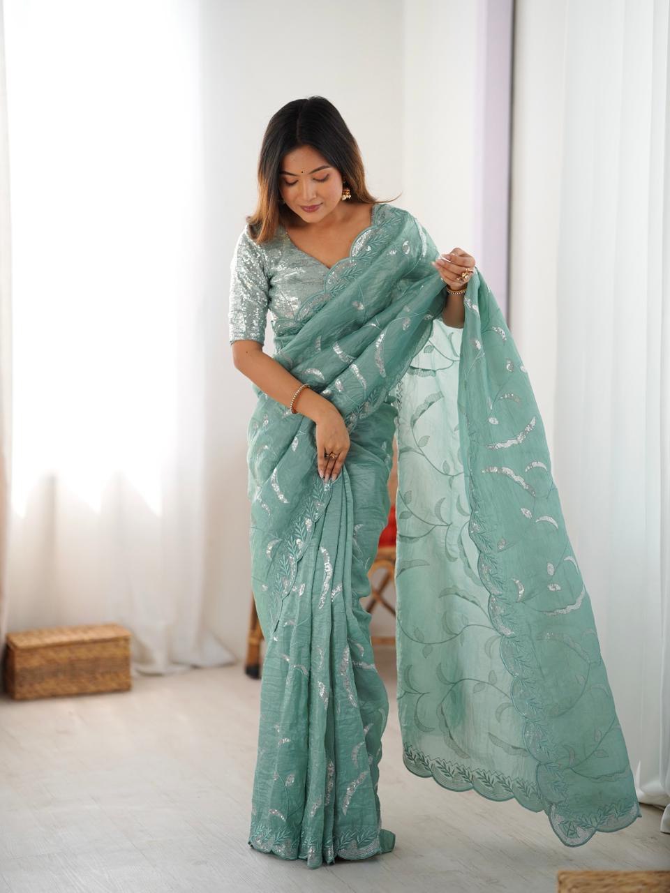 sage green embroidered saree with matching blouse